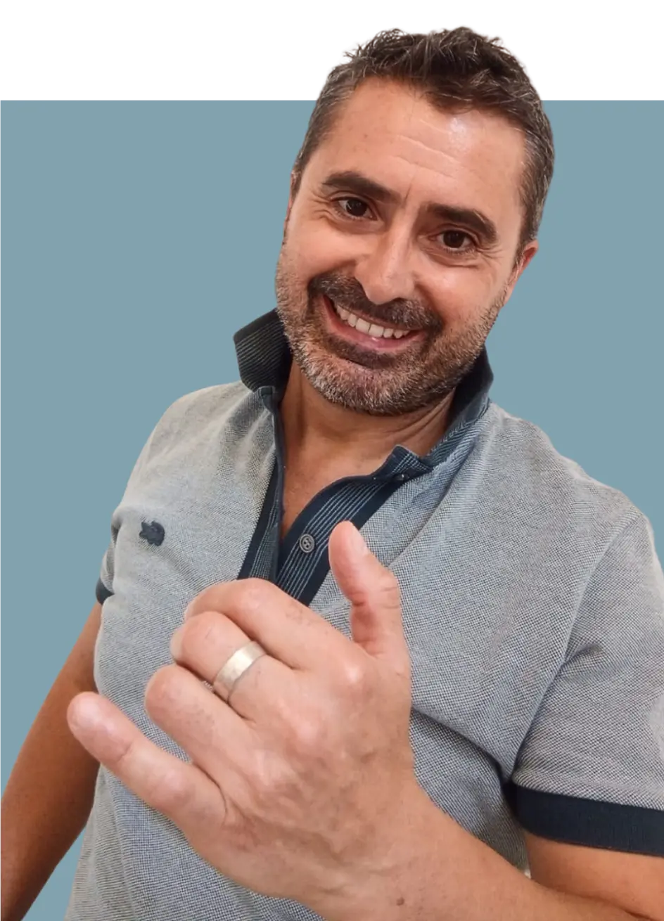 Massimo Brullo smiling and greeting as a Travel Designer